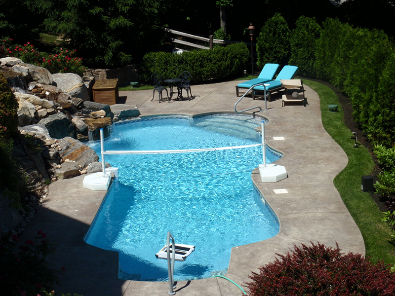 Swimming pool and stamped concrete project example 47